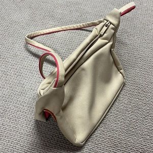 Mandarina Duck Adjustable Shoulder Bag. Beige with hot pink piping.